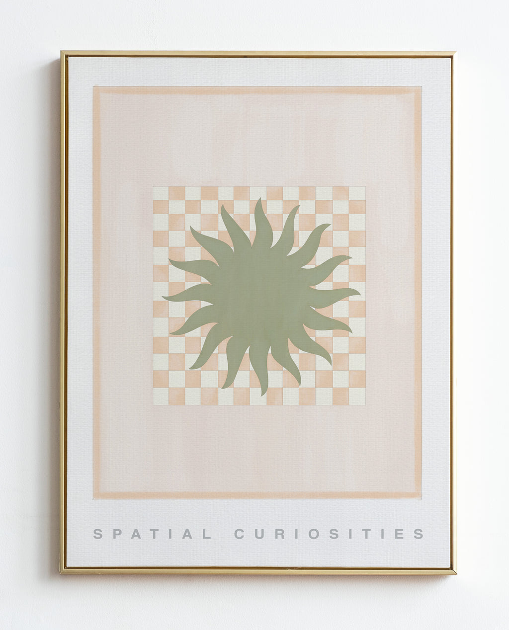 Framed artwork with a green abstract design on a checkered background, labeled 'Spatial Curiosities'.